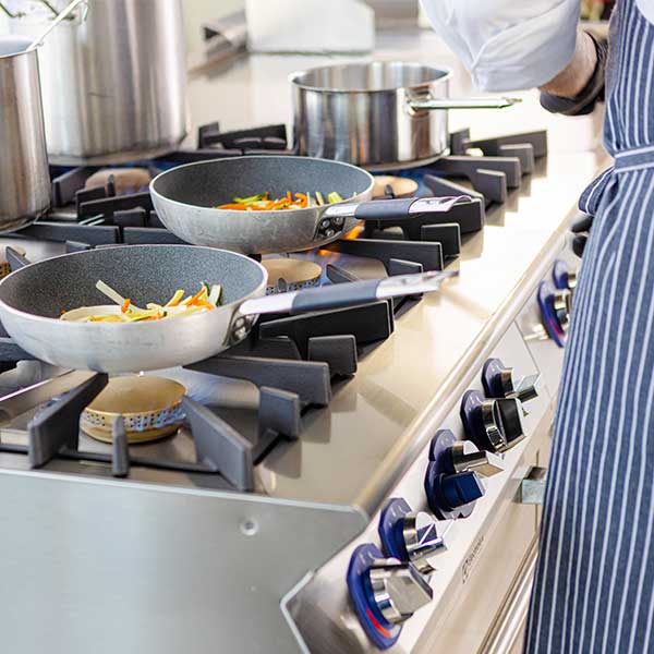 chef with various pans chef with various pans